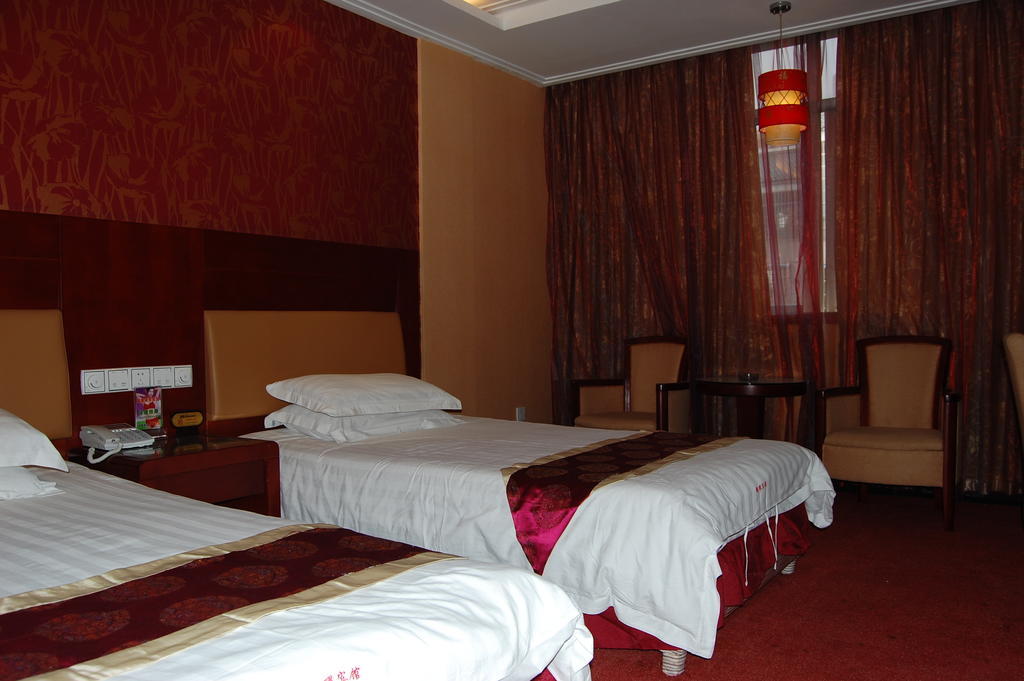 Jinyao Business Hotel Іу Номер фото